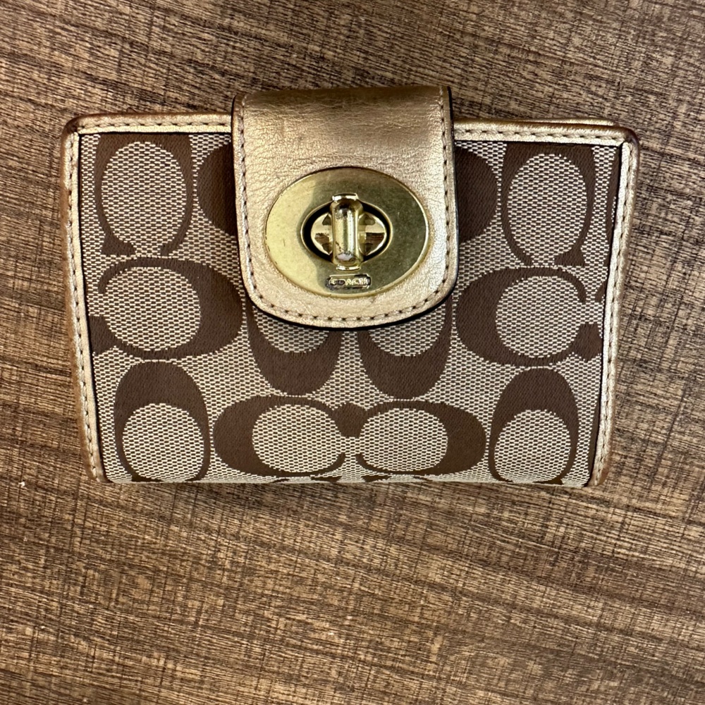 Tan and gold Coach Wallet
